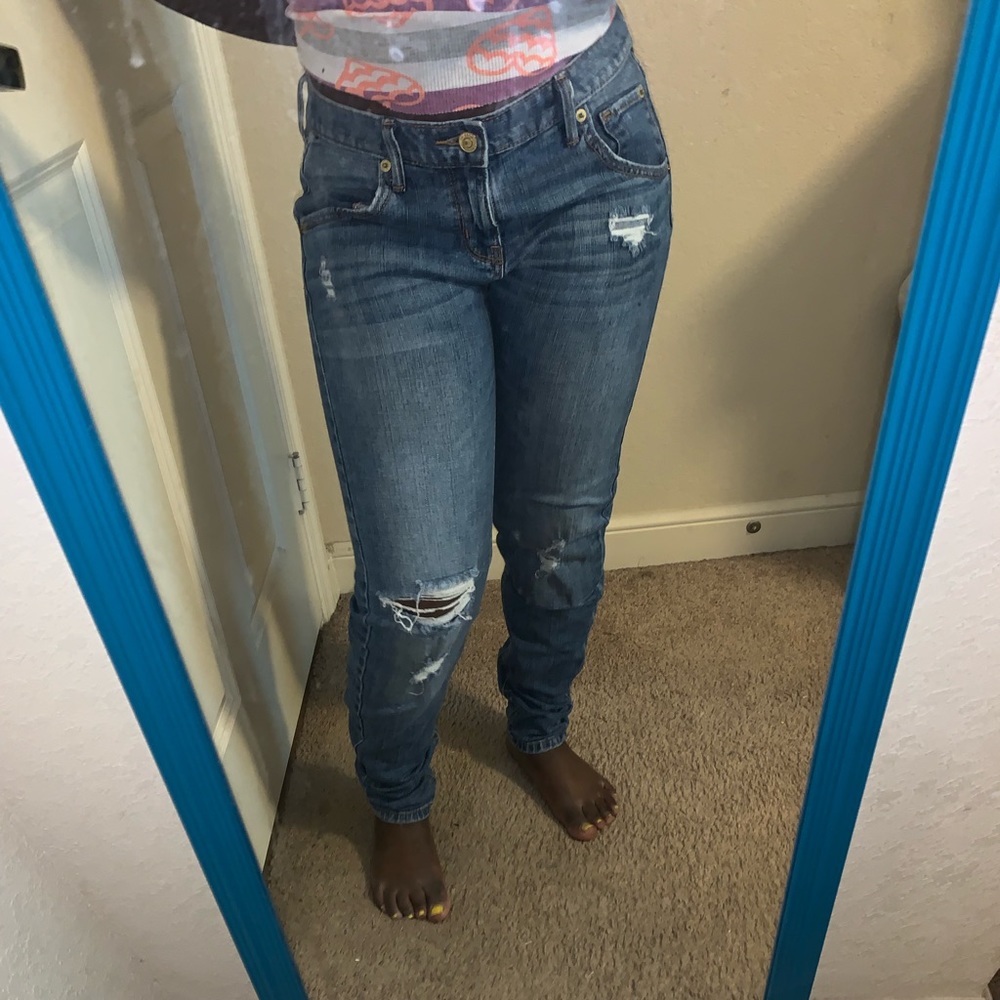 Skinny boyfriend cut up denim jeans